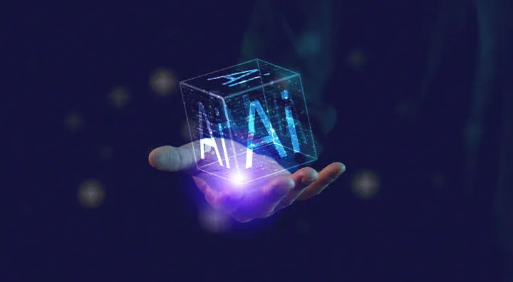 一只发光的手握着一个透明立方体，上面发着“AI”字母。